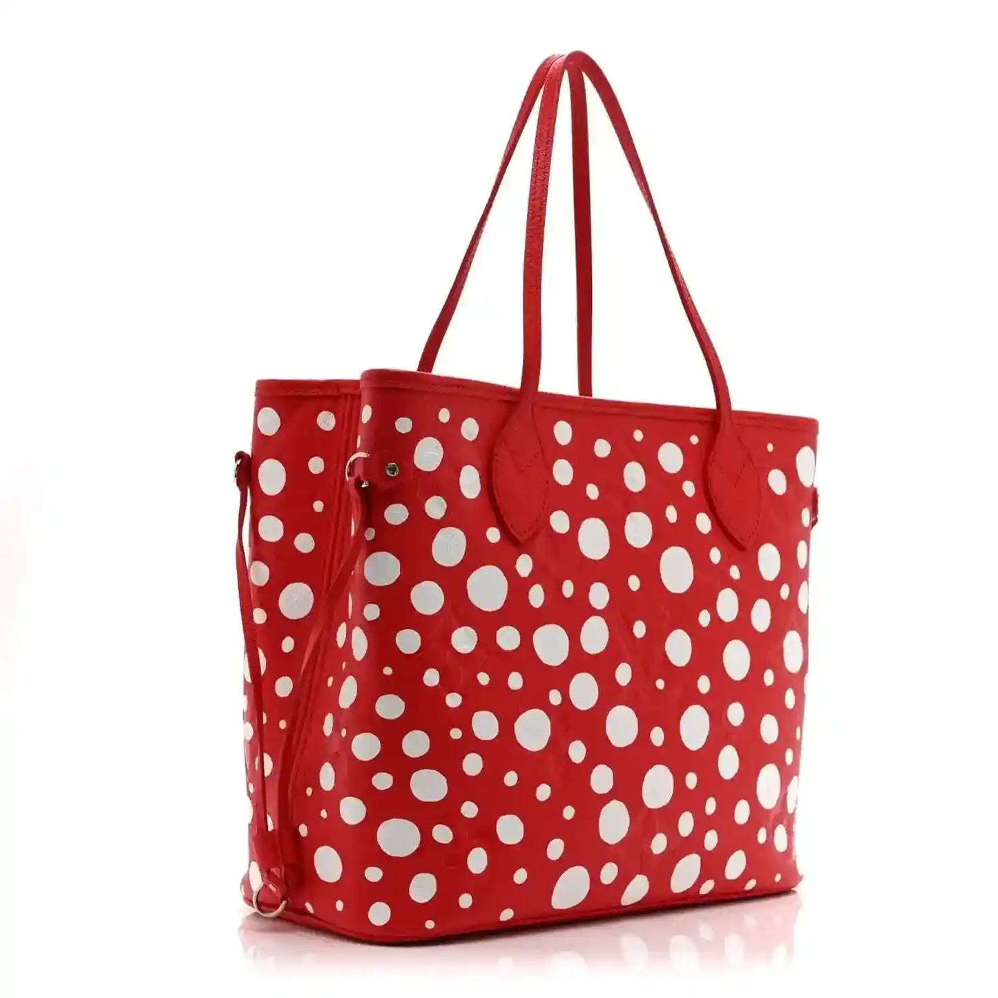 Red polka-dot tote bag with two top handles and dangling tassel pull