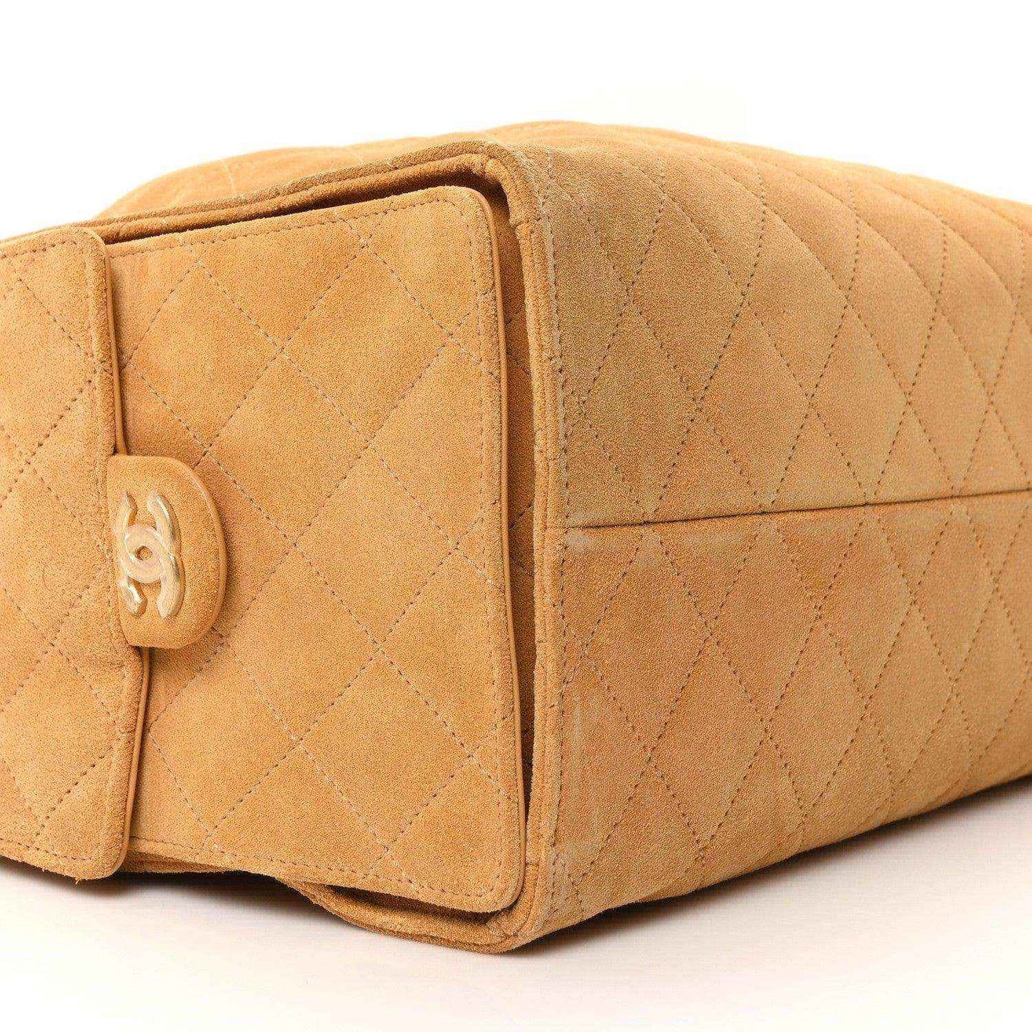 Chanel medium quilted suede handbag in classic beige, front flap with turnlock closure