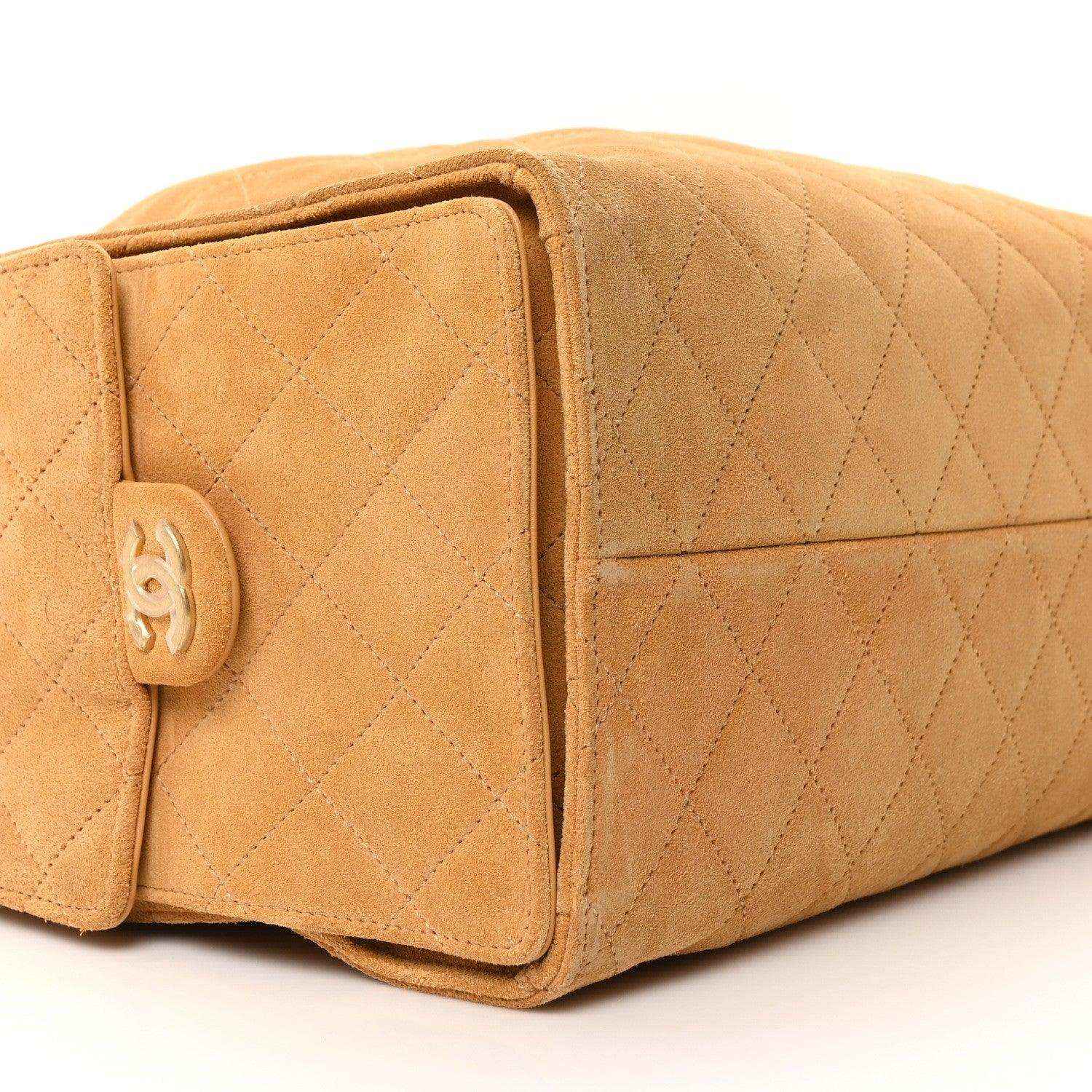 Chanel medium quilted suede handbag in classic beige, front flap with turnlock closure