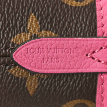 Louis Vuitton monogram inside pocket label on pink leather trim