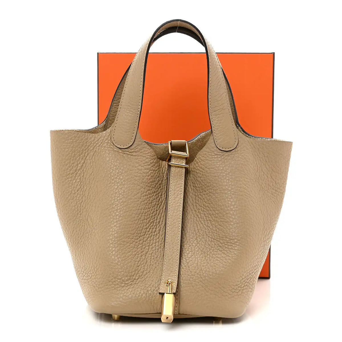 Beige grained calfskin bucket handbag with top handles and gold lock clasp.