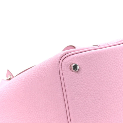 Rose Sakura pink pebbled leather handbag corner with metal stud and top edge