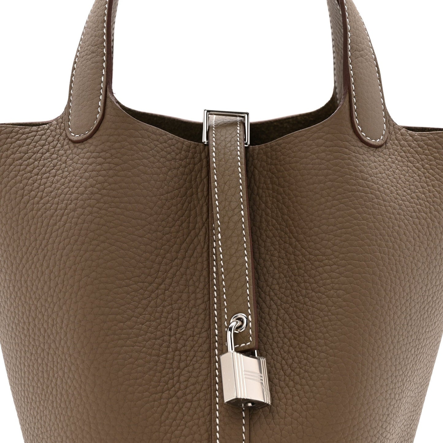 Etoupe leather tote with lock clasp and contrast-stitched strap detail