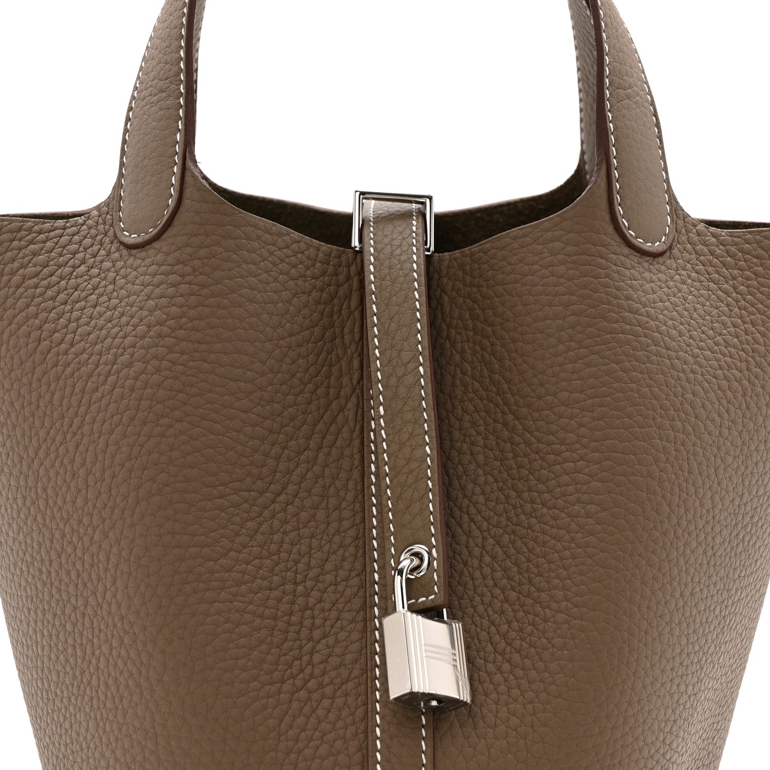 Etoupe leather tote with lock clasp and contrast-stitched strap detail