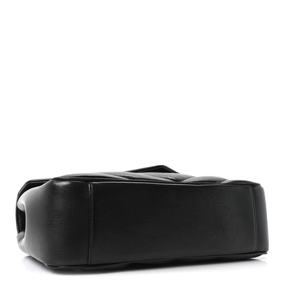 Black medium shoulder bag with smooth base and quilted sides