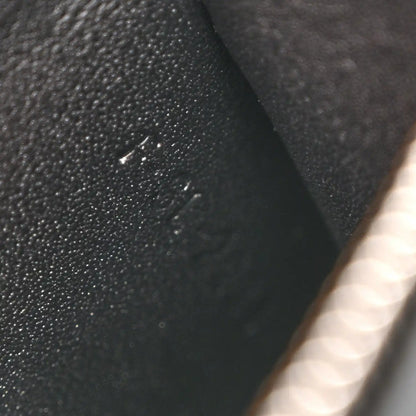 Black leather bag with small visible surface marks on the exterior