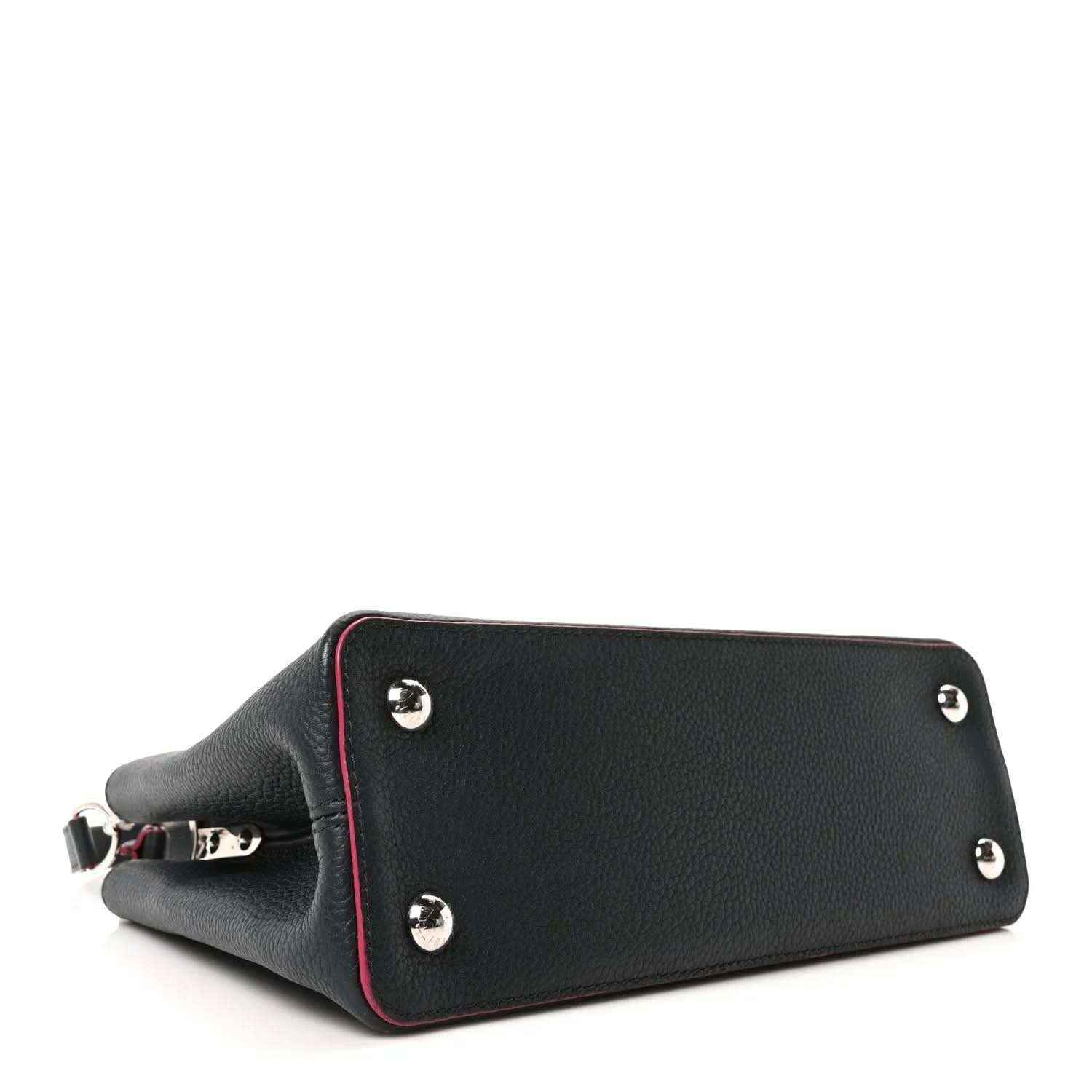 Louis Vuitton Capucines PM leather bag, dark blue body with fuchsia-edged panel and silver studs