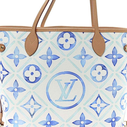 Louis Vuitton Neverfull tote front close-up in blue monogram tile with tan handles