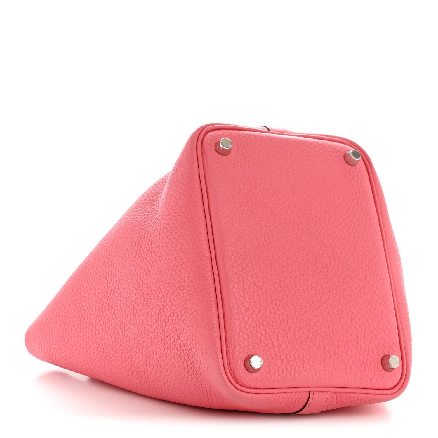 Pink leather tote with triangular fold, metal snap studs, and corner grommets