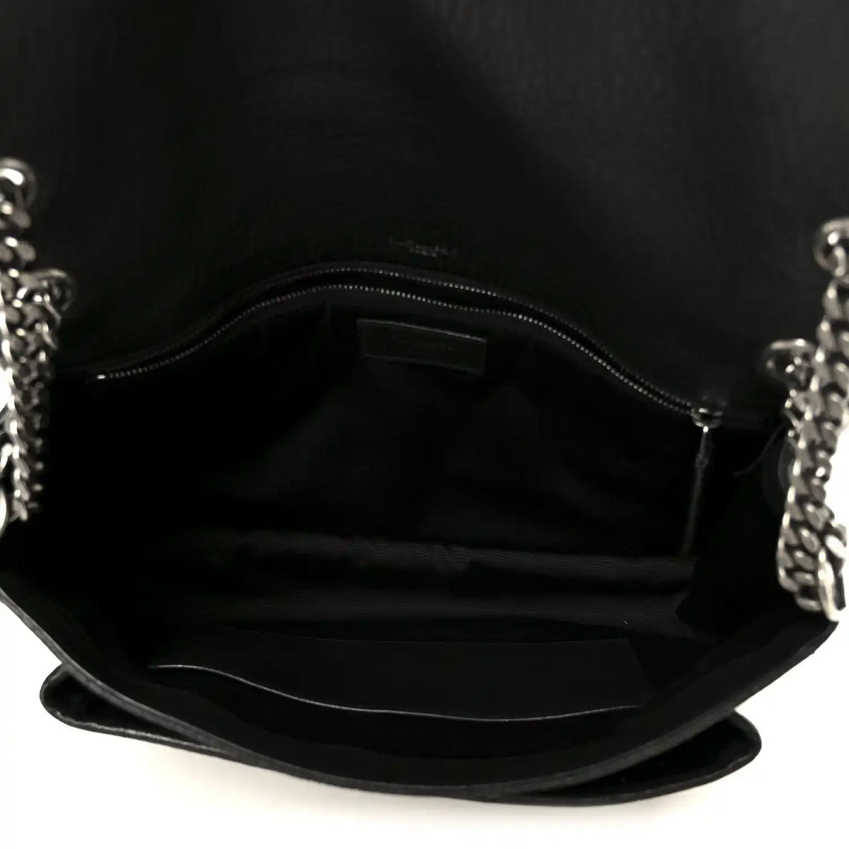 Black leather Niki chain satchel interior with zippered pocket