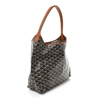 Goyard hobo bag with brown leather handle, dark patterned canvas all over