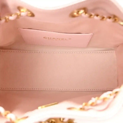 Chanel light pink leather mini 25 handbag interior with lining and stitching