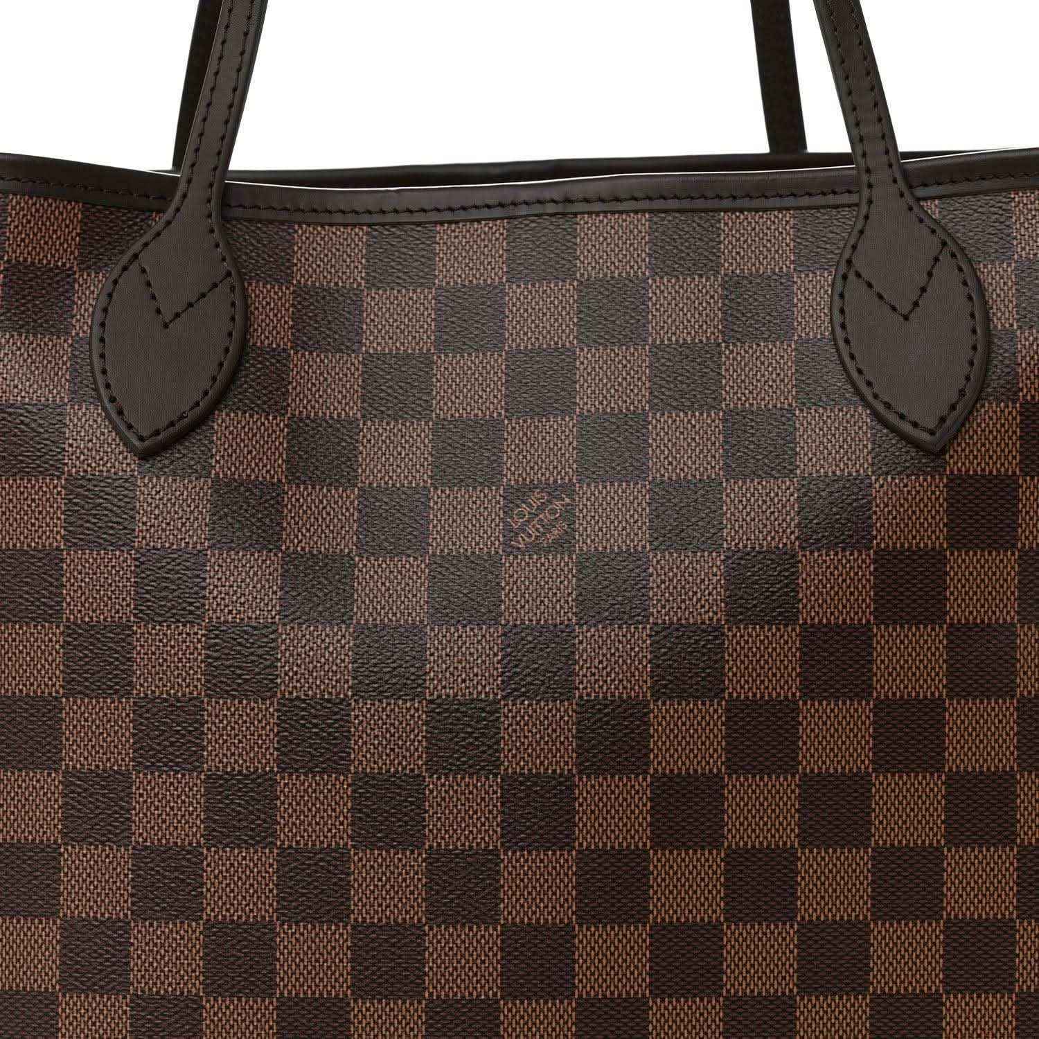 Damier Ebene tote bag front panel with dark leather trim and handles