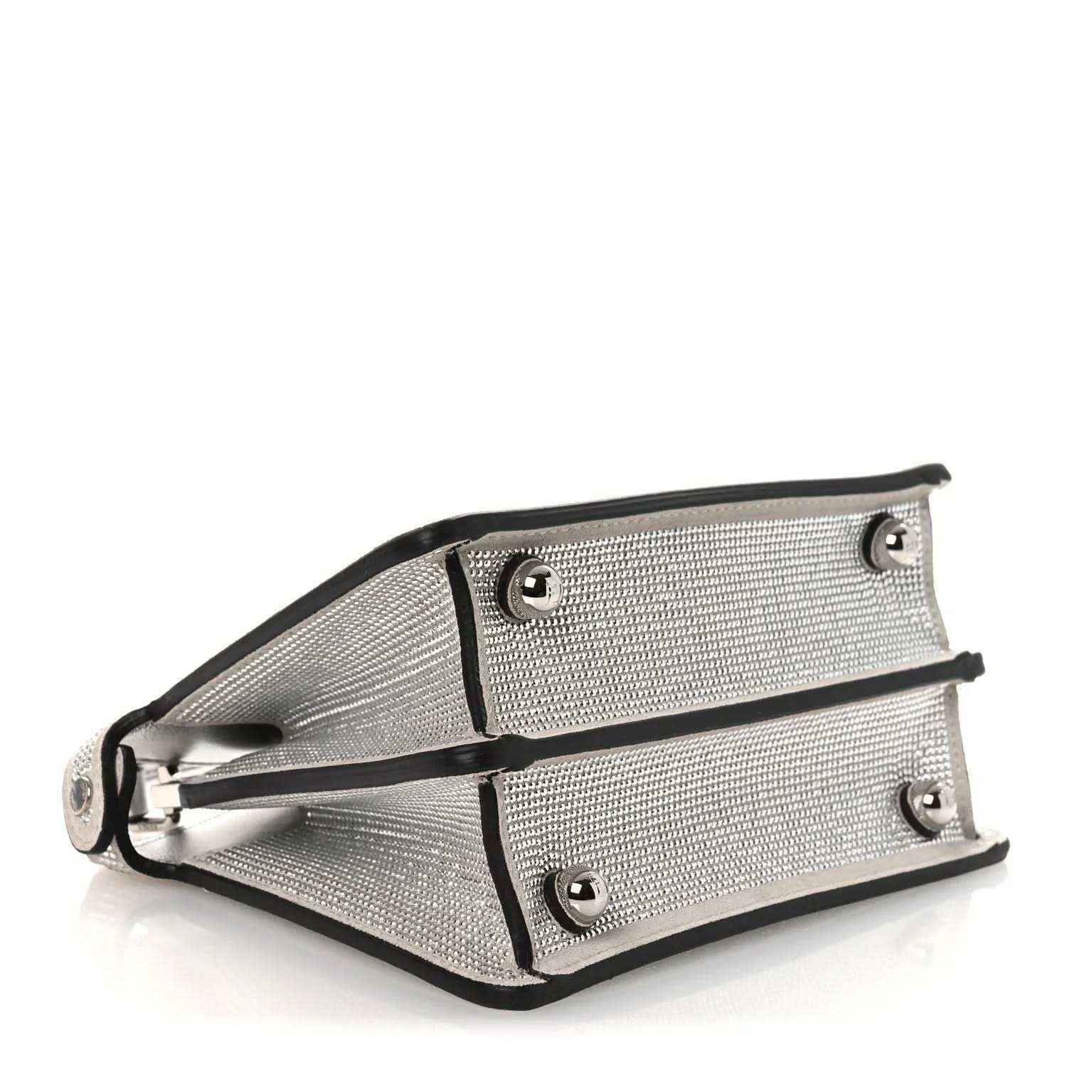 Silver crystal leather satchel base with black trim and snap hardware