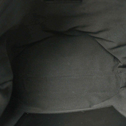 Chanel shopping bag interior lining in dark fabric with stitched seam