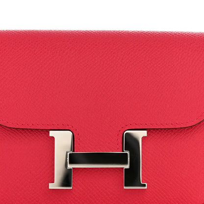 Hermes slim wallet rose red textured leather with silver H clasp hardware