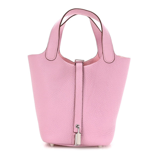 Rose pink leather handbag with top handles and front lock detail