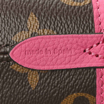 Louis Vuitton monogram inside label on pink leather trim reading 'made in Spain'