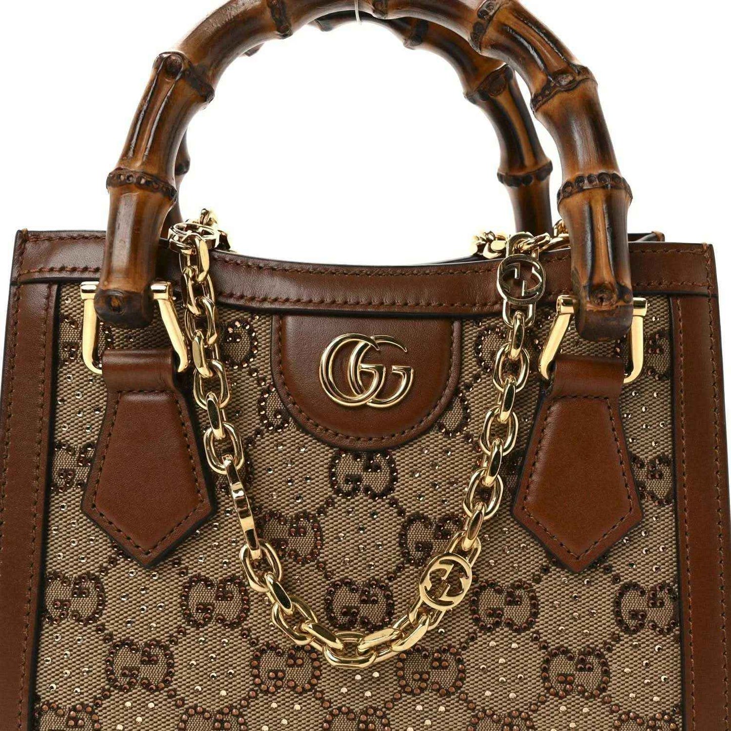 Gucci mini tote bag front, tan GG monogram canvas with brown leather pocket and gold chain