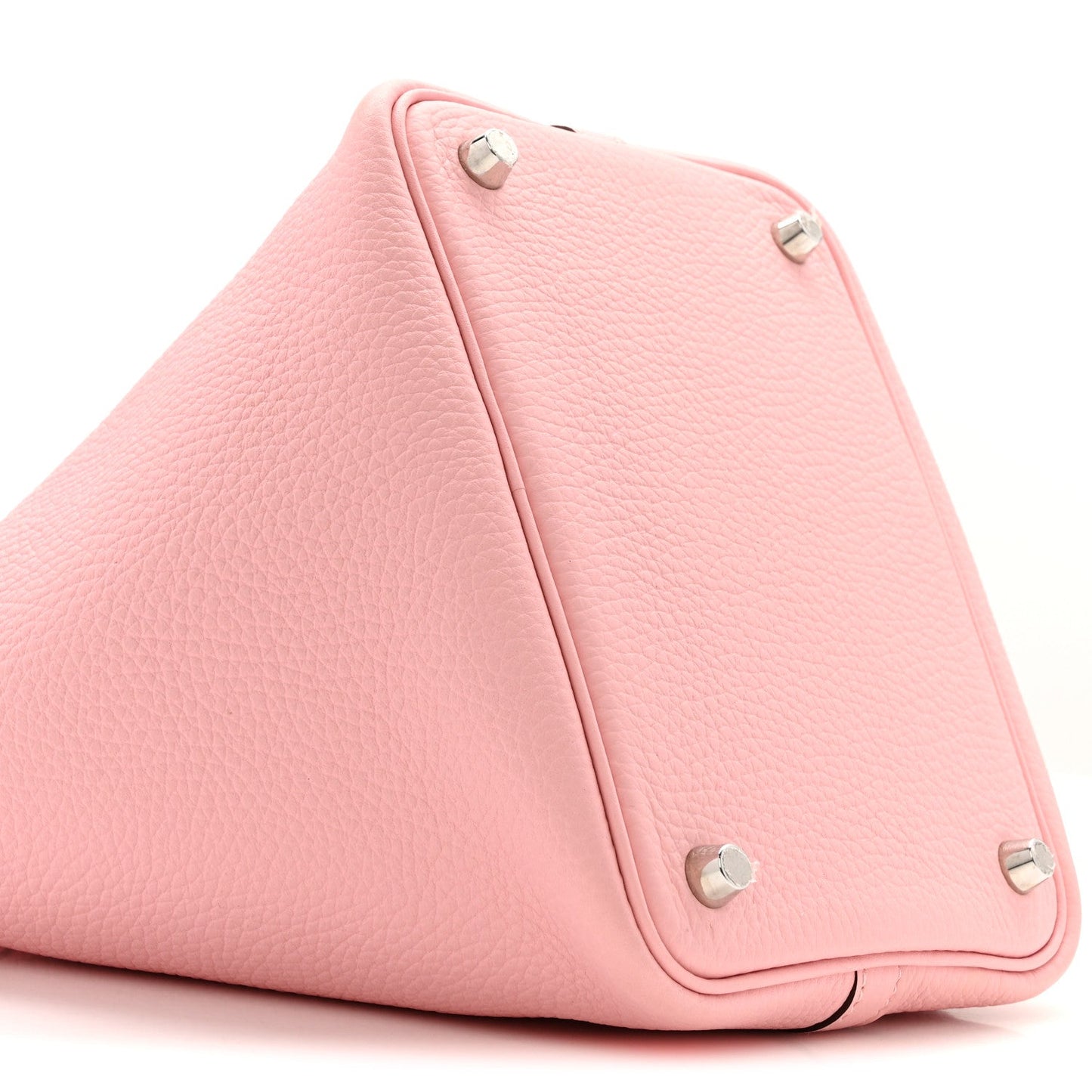 Rose pink leather handbag with triangular fold and silver snap studs