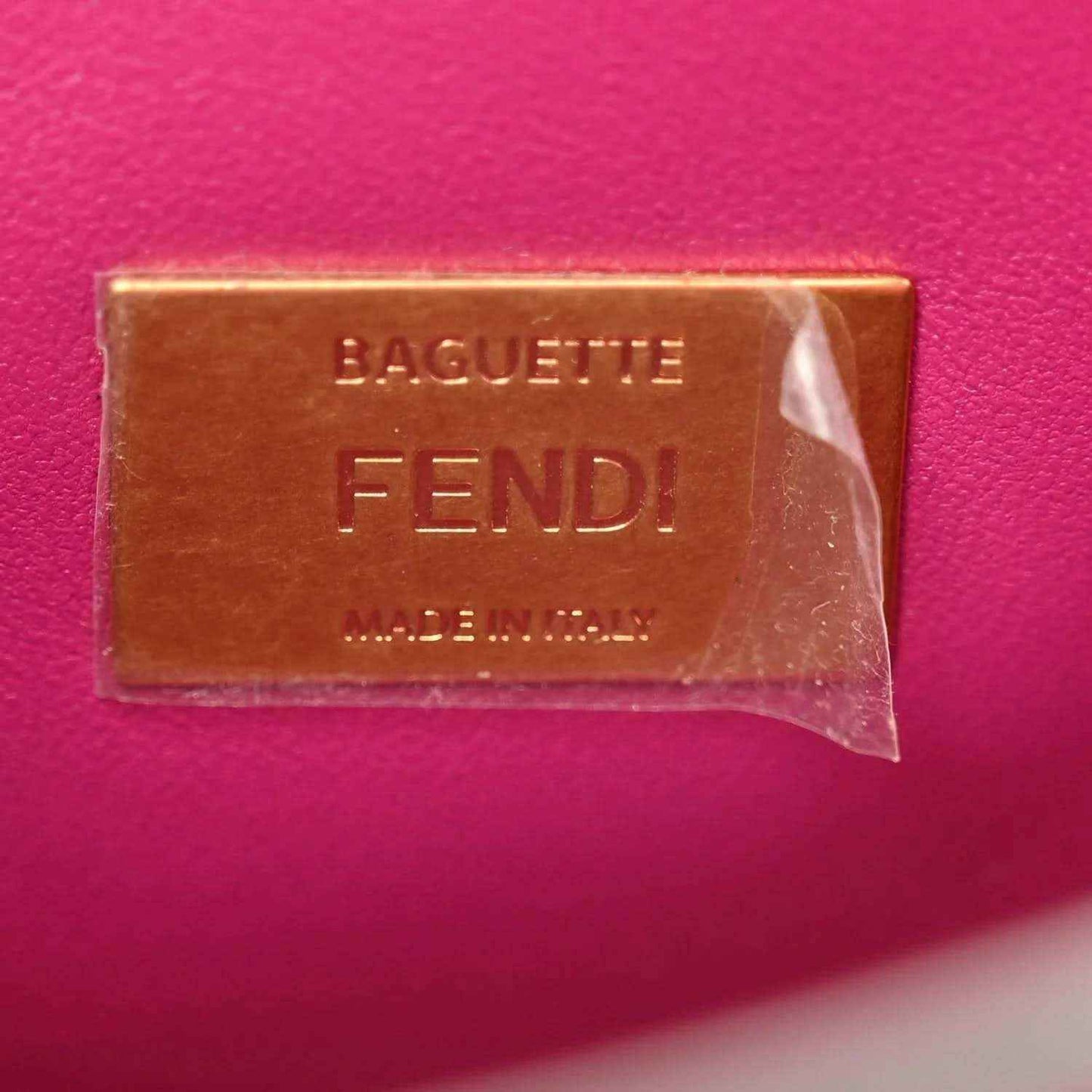 Leather brand label reading Baguette FENDI and Made in Italy