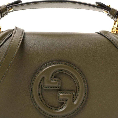 Gucci medium Blondie top-handle bag, forest green leather, G emblem front detail