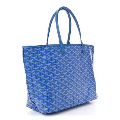 Sky blue Goyardine tote bag with long top handles, angled front view