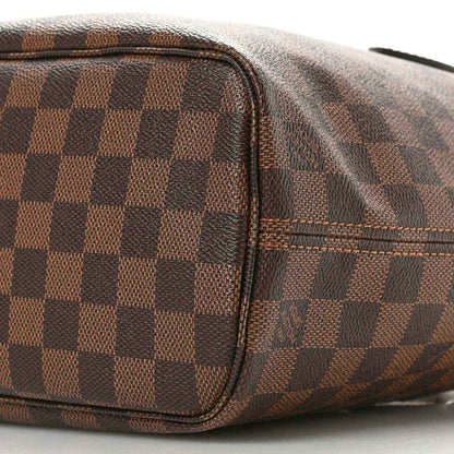 Louis Vuitton Damier Ebene Neverfull PM tote bag close-up of side seam and pocket trim