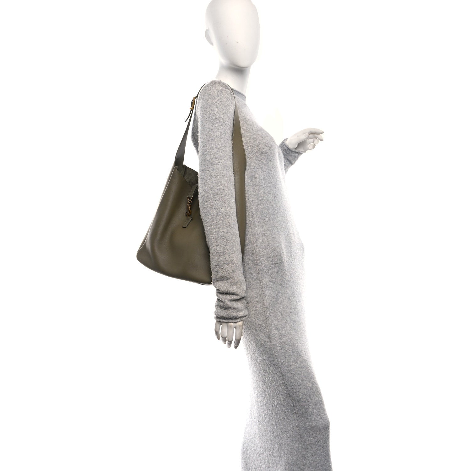 Olive leather hobo bag worn on shoulder by a model