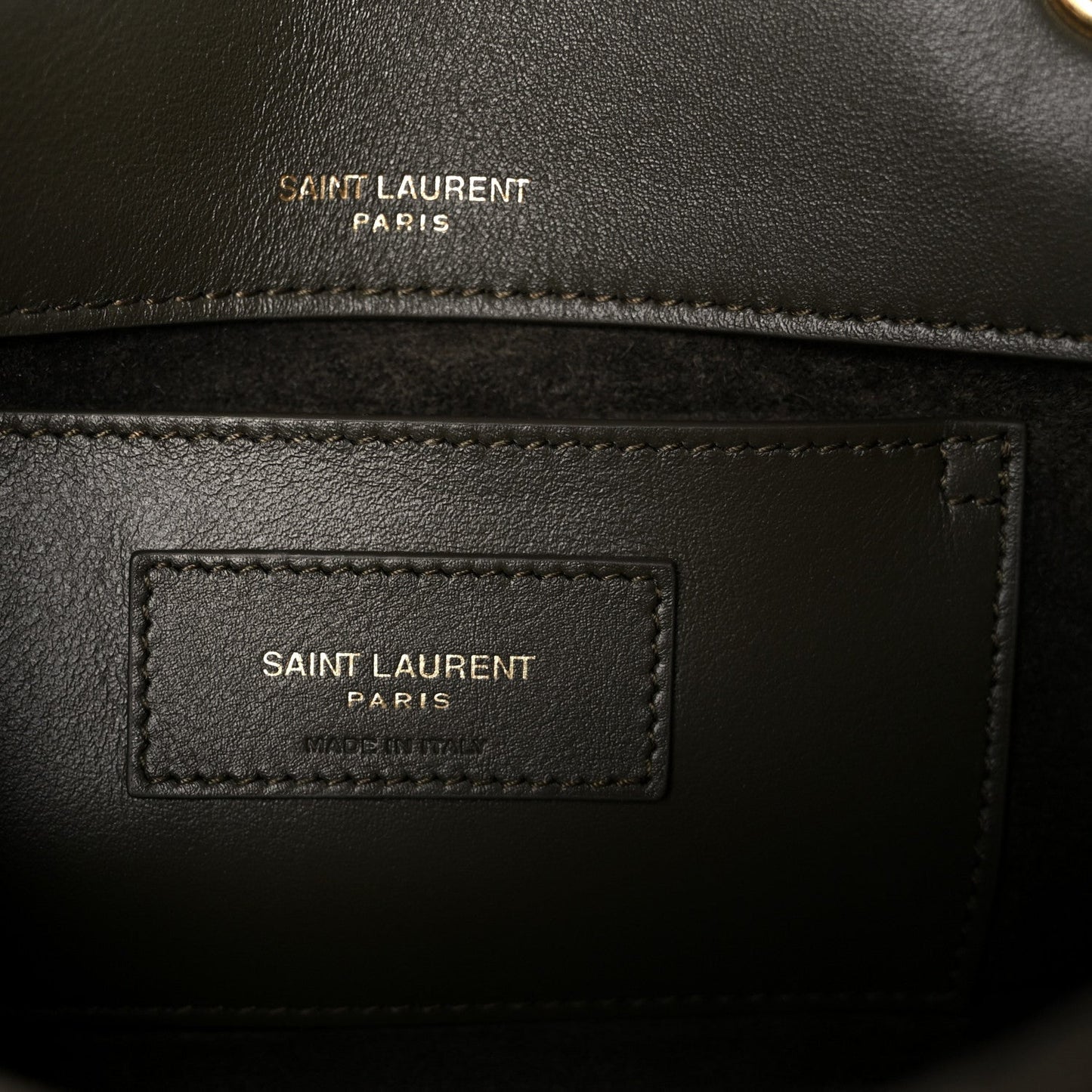 Leather interior label with 'SAINT LAURENT PARIS' text and stitched border