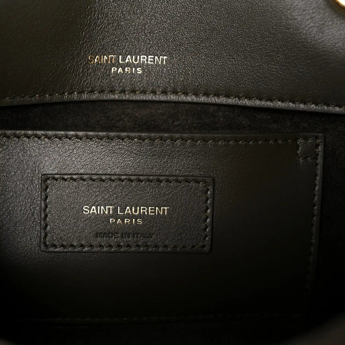 Leather interior label with 'SAINT LAURENT PARIS' text and stitched border