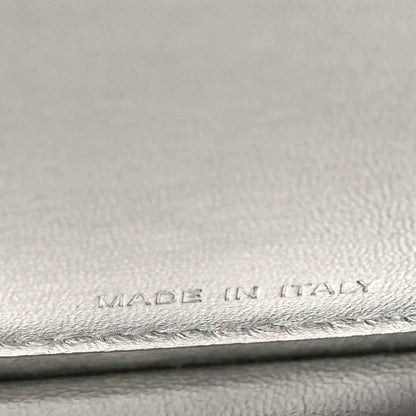 “MADE IN ITALY” embossing on interior leather lining, with stitched edge.