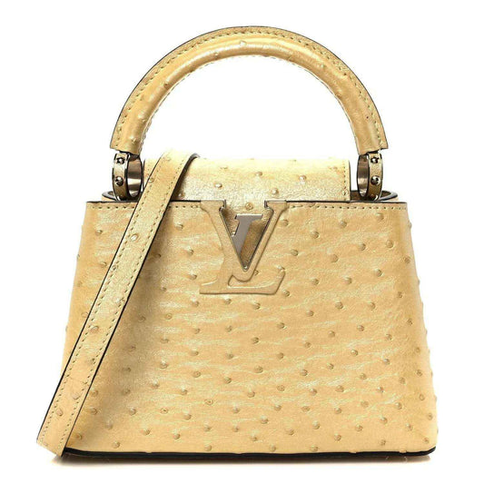 Yellow ostrich-embossed mini top-handle bag with LV logo and leather straps