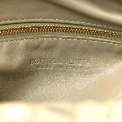 Bottega Veneta logo stamp on leather interior with zipper edge