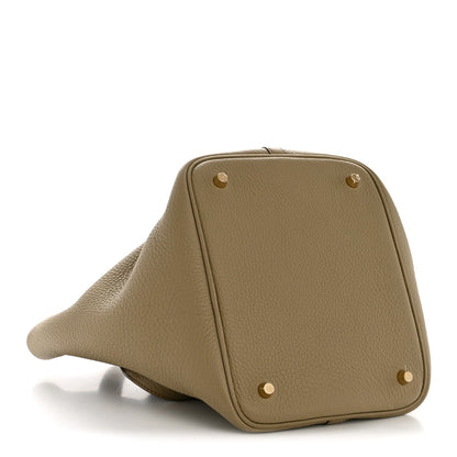 Beige leather Picotin 22 tote with gold-tone corner studs and structured sides