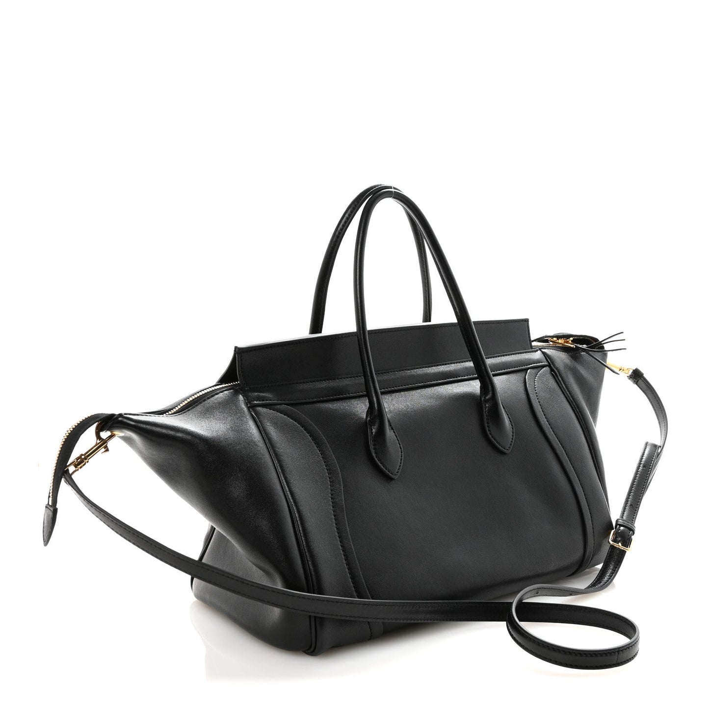 Black leather luggage bag with crossbody strap and gold zip pulls.