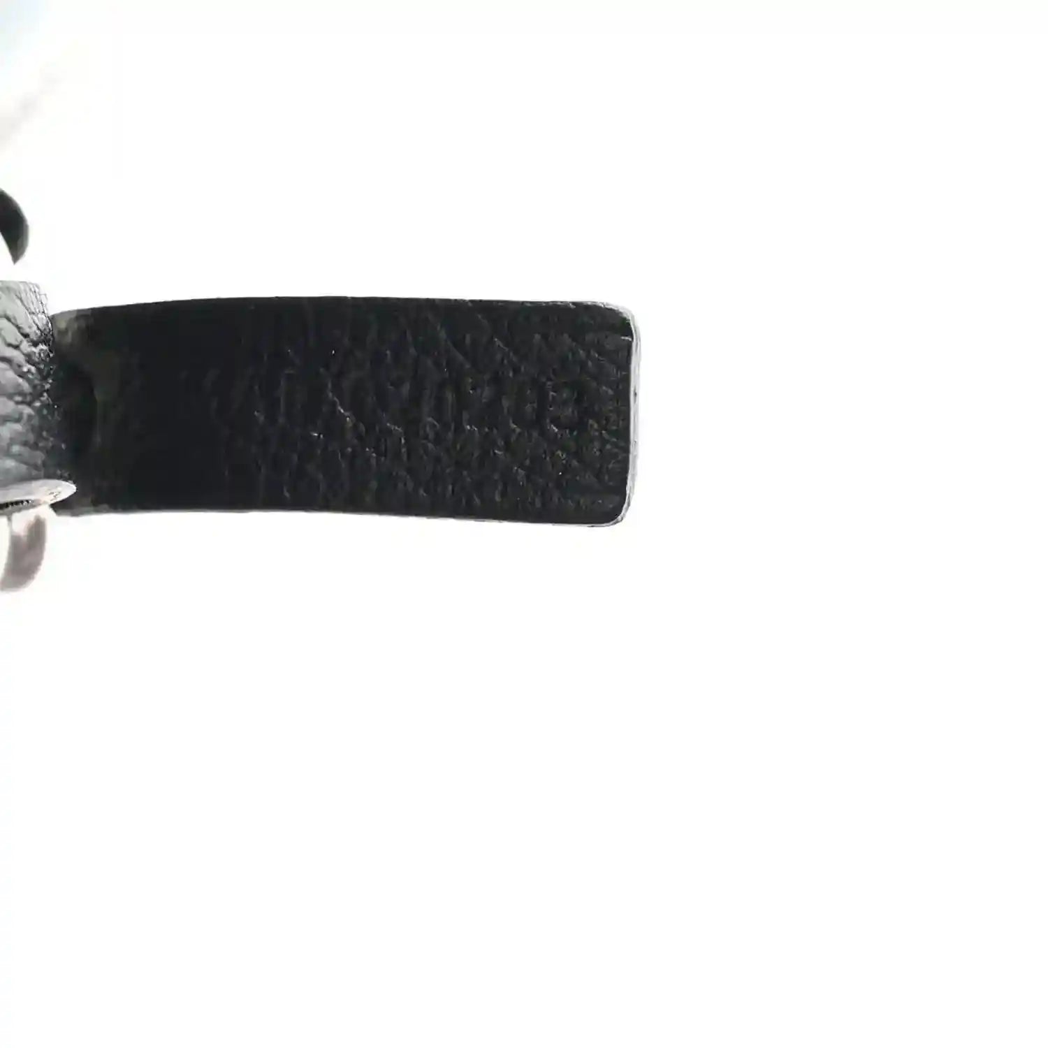 Tote bag strap base with stitched leather edge and metal hardware detail