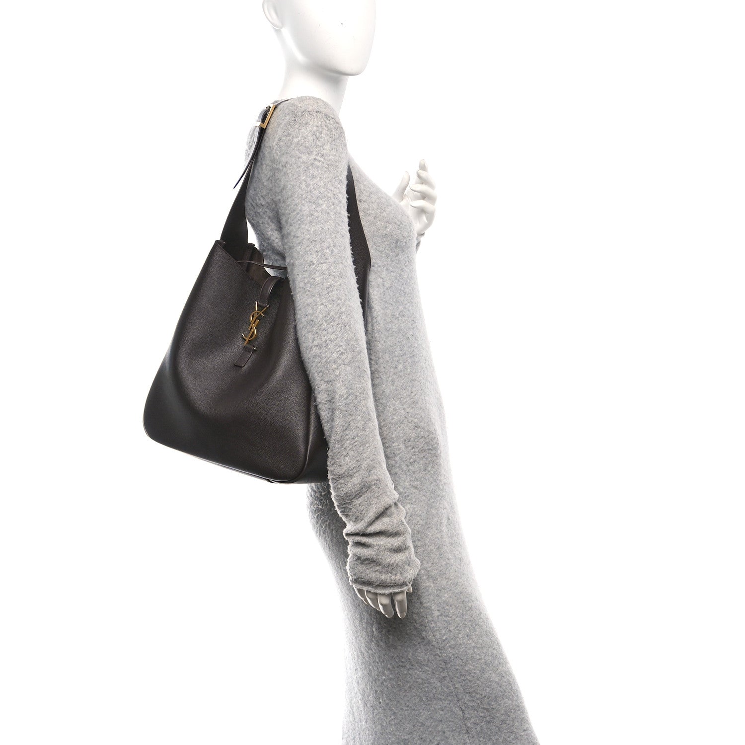 Large soft hobo bag in dark leather on the side, with top handle