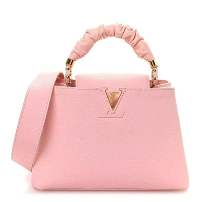 Bubble gum pink leather Capucines BB bag with top handles and gold logo V