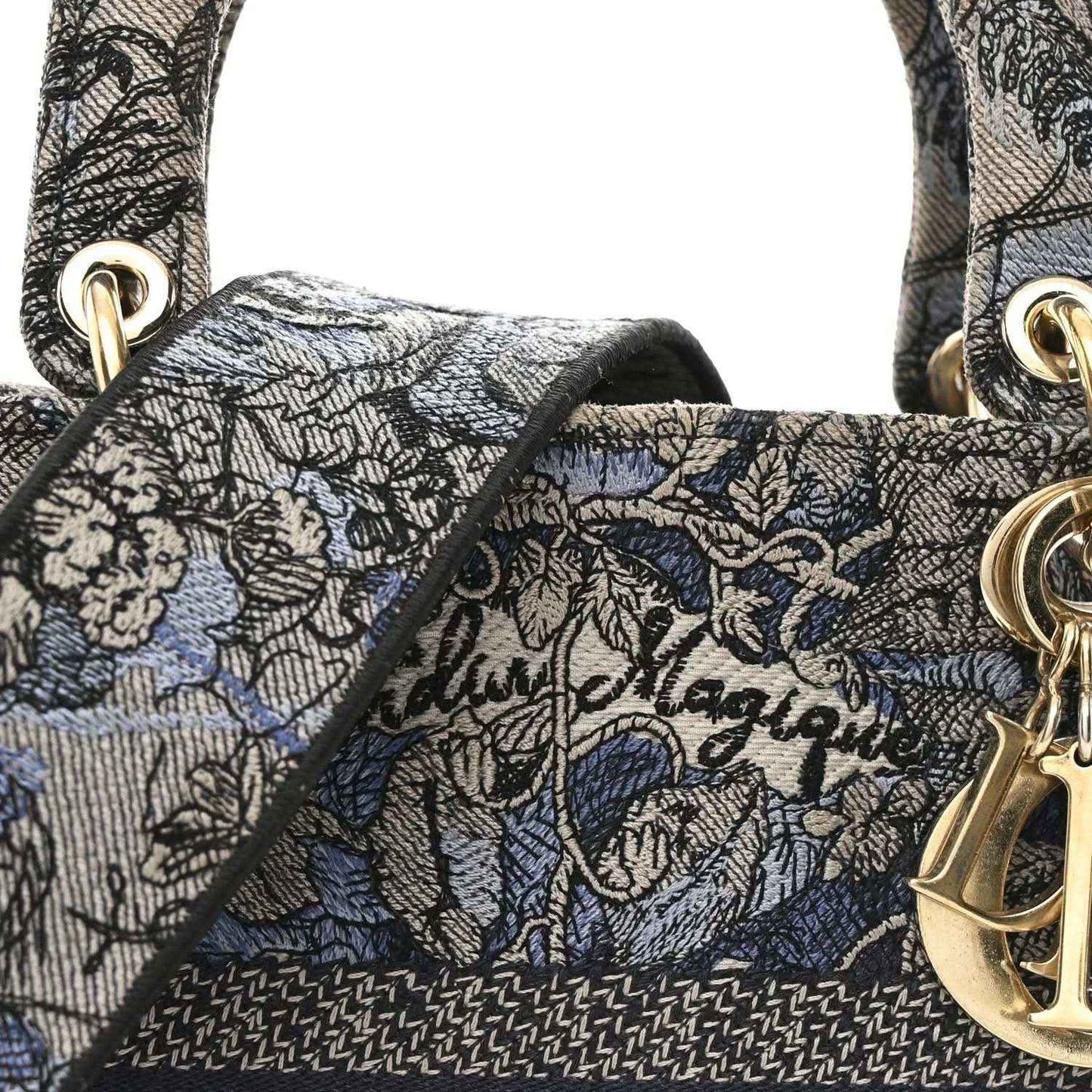 Christian Dior embroidered denim bag front panel with gold Dior charm hardware