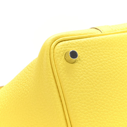 Lime leather tote corner with round metallic snap stud