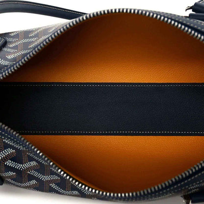 Goyardine Bonbonniere bag interior lining in orange with visible zipper