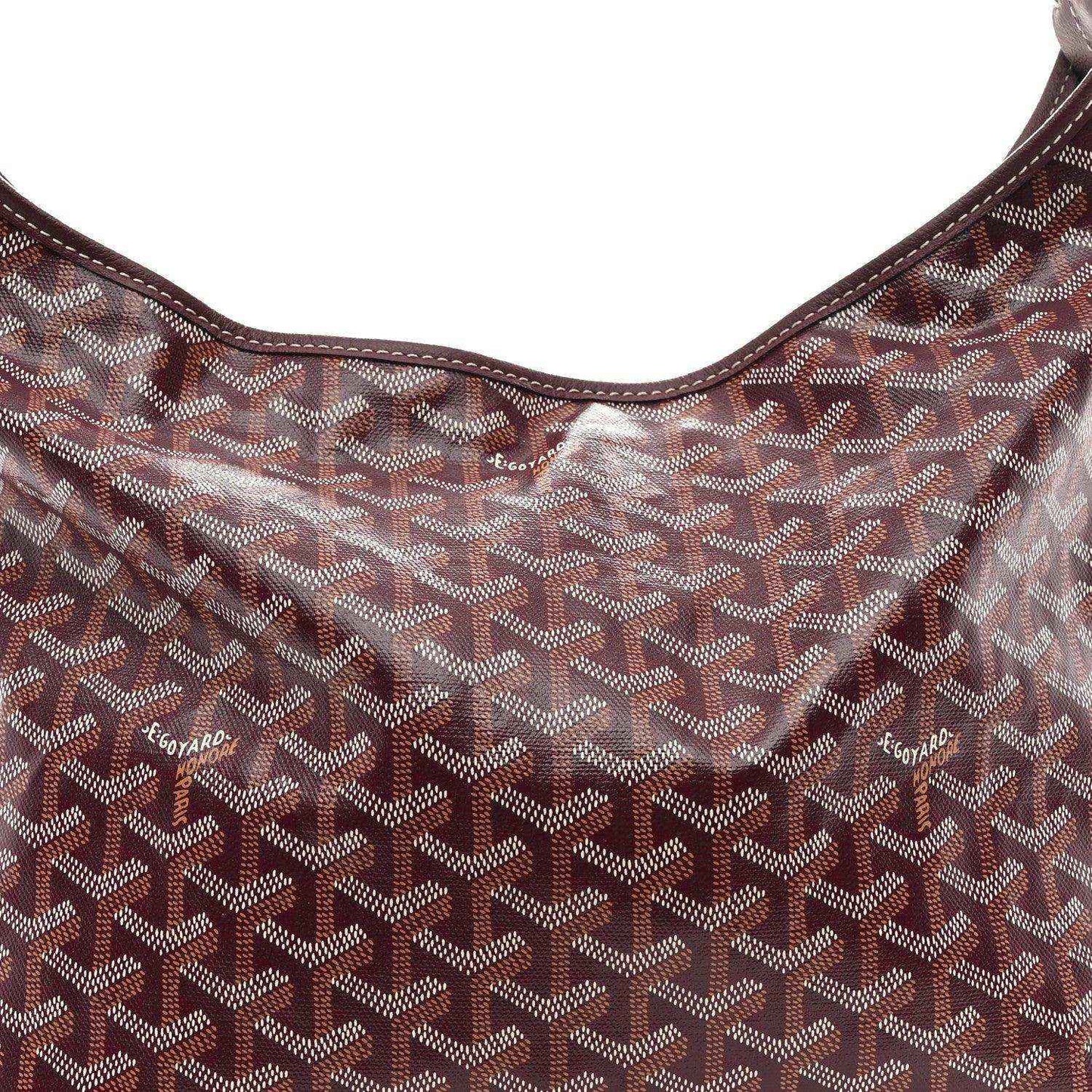 Burgundy Goyardine-pattern coated canvas with stitched edge and small logo stamp