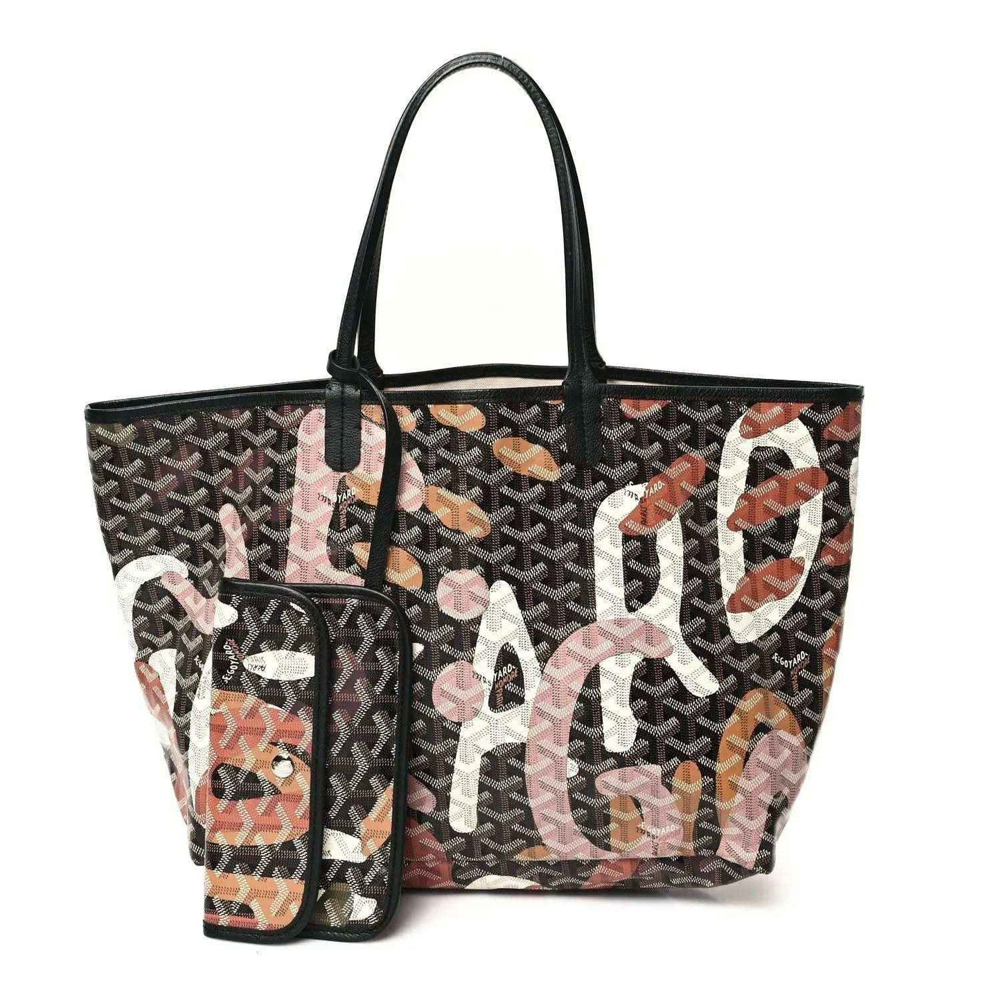 PM tote bag with black top handles, dark monogram pattern, and large pink and orange letter graphics