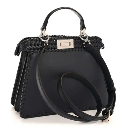 Nappa satchel with woven front, top handles, and adjustable crossbody strap