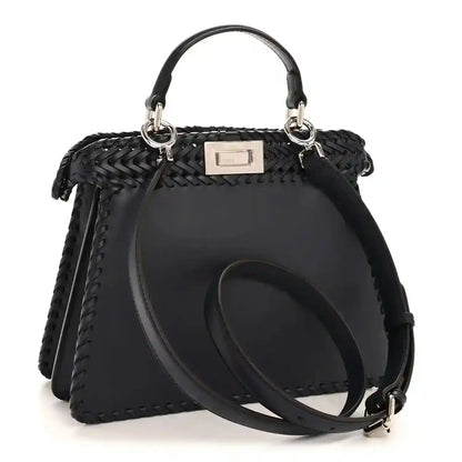 Nappa satchel with woven front, top handles, and adjustable crossbody strap