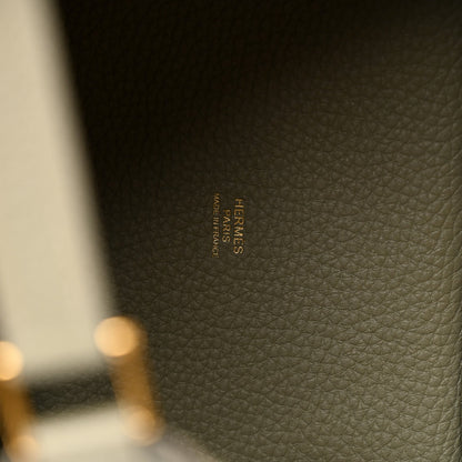Sauge leather tote bag interior stamp label in tan-gold text