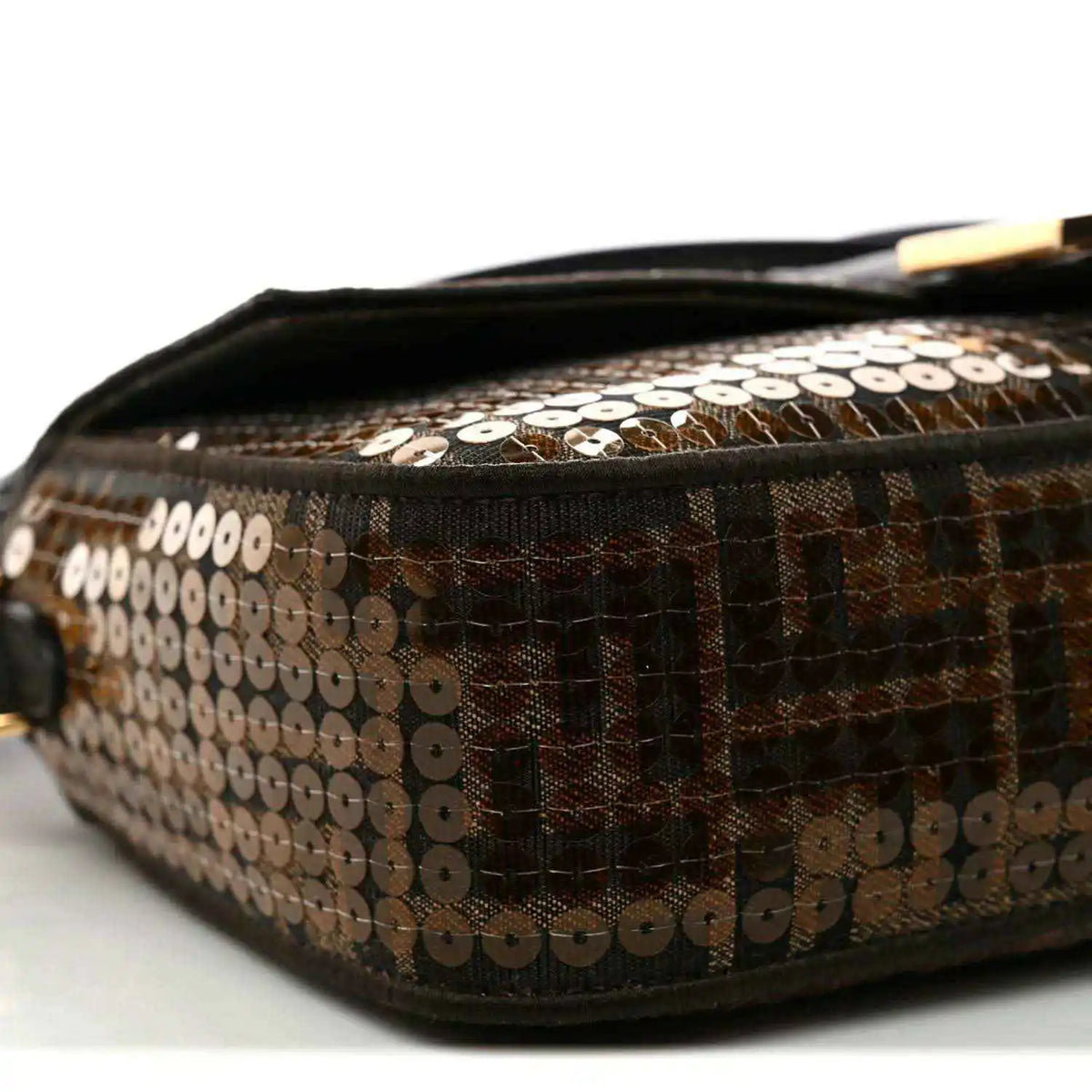 Fendi baguette bag end panel close-up with brown sequin jacquard pattern