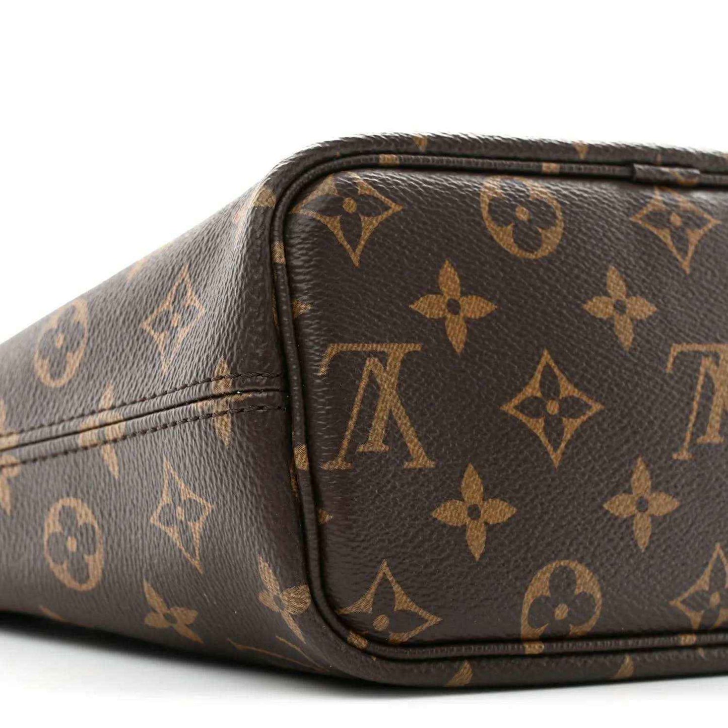 Dark monogram mini bag with curved top edge and matching monogram pattern on sides