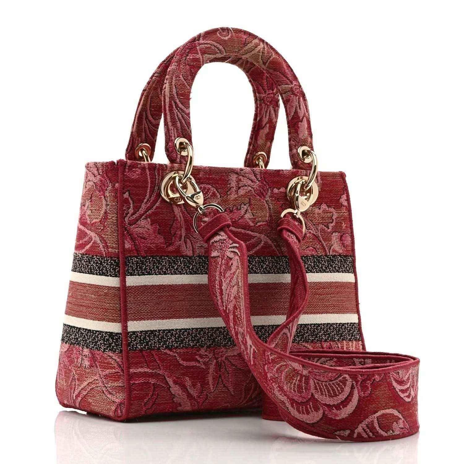 Pink embroidered canvas medium handbag with top handles, logo stripe, and wrist strap
